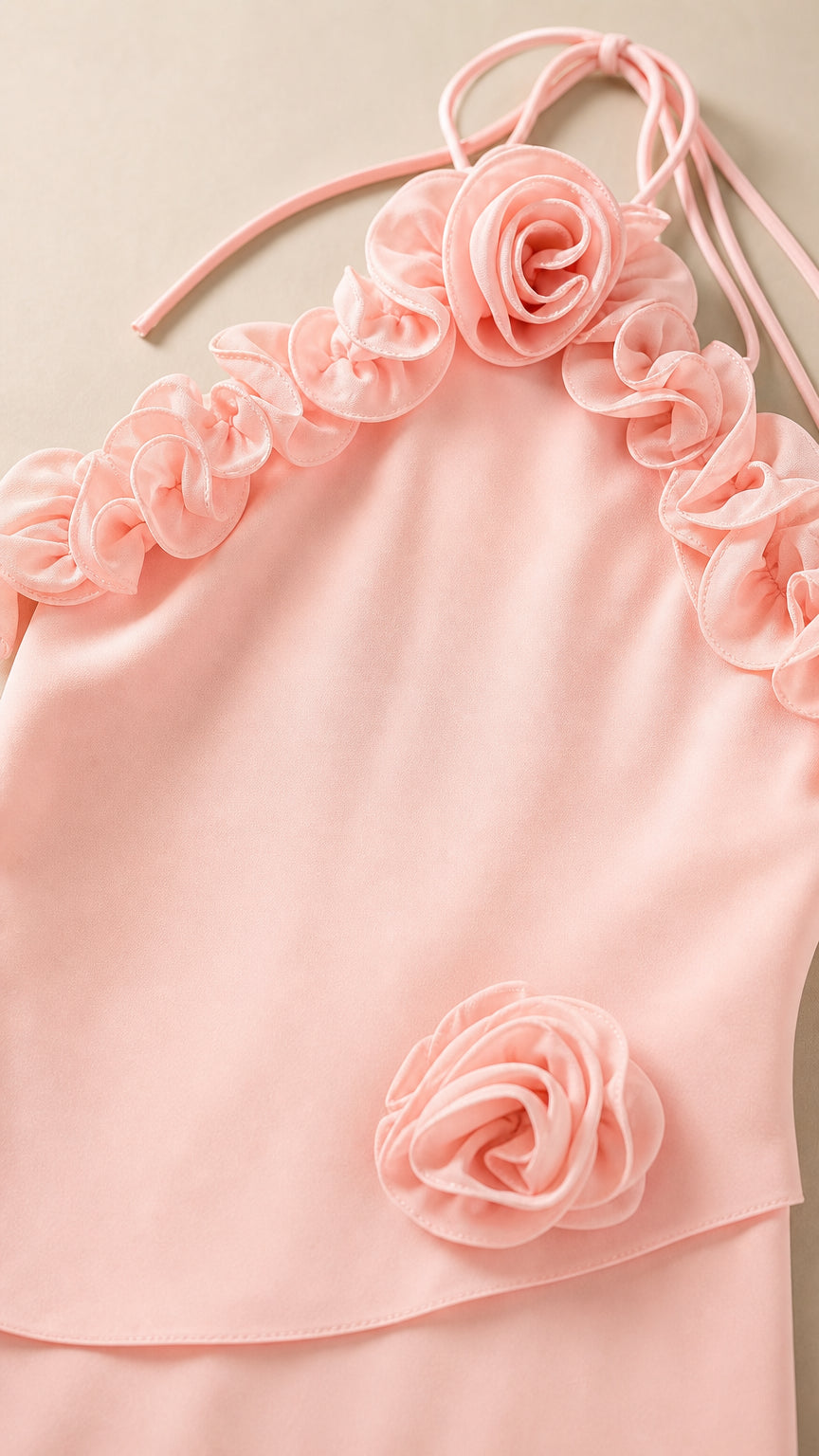 Close-up detail of 3D rosette collar and bodice accent