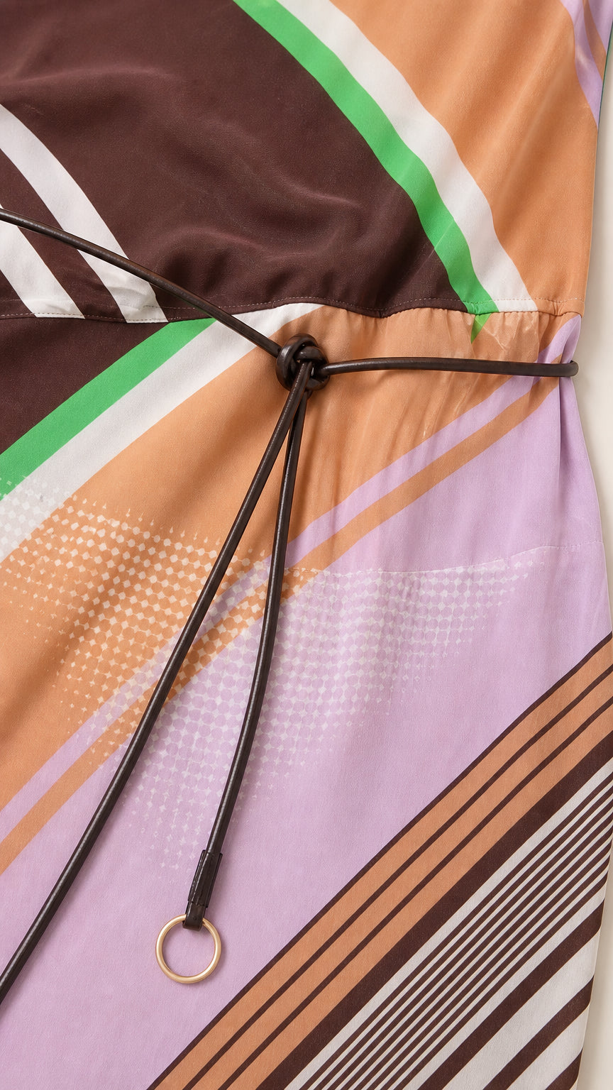 Close-up detail of fabric, diagonal stripes, and thin waist belt
