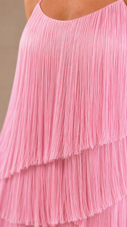 Close-up detail of the cascading pink fringe layers