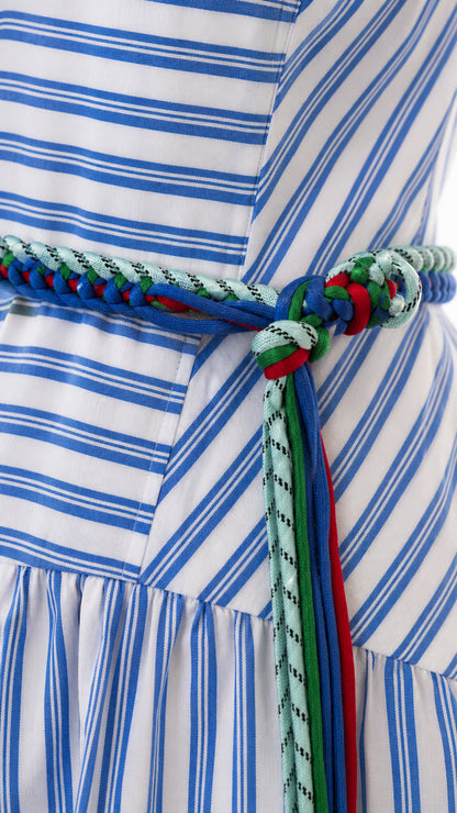 Close-up detail of fabric stripes and braided rope belt
