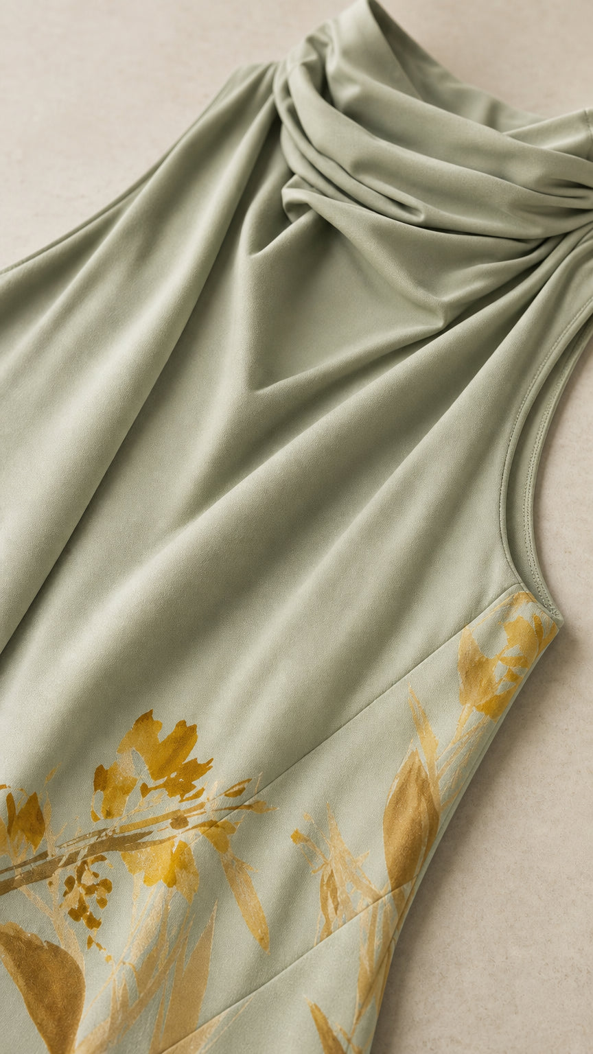 Close-up of cowl neck drape and fabric texture in Sage Green