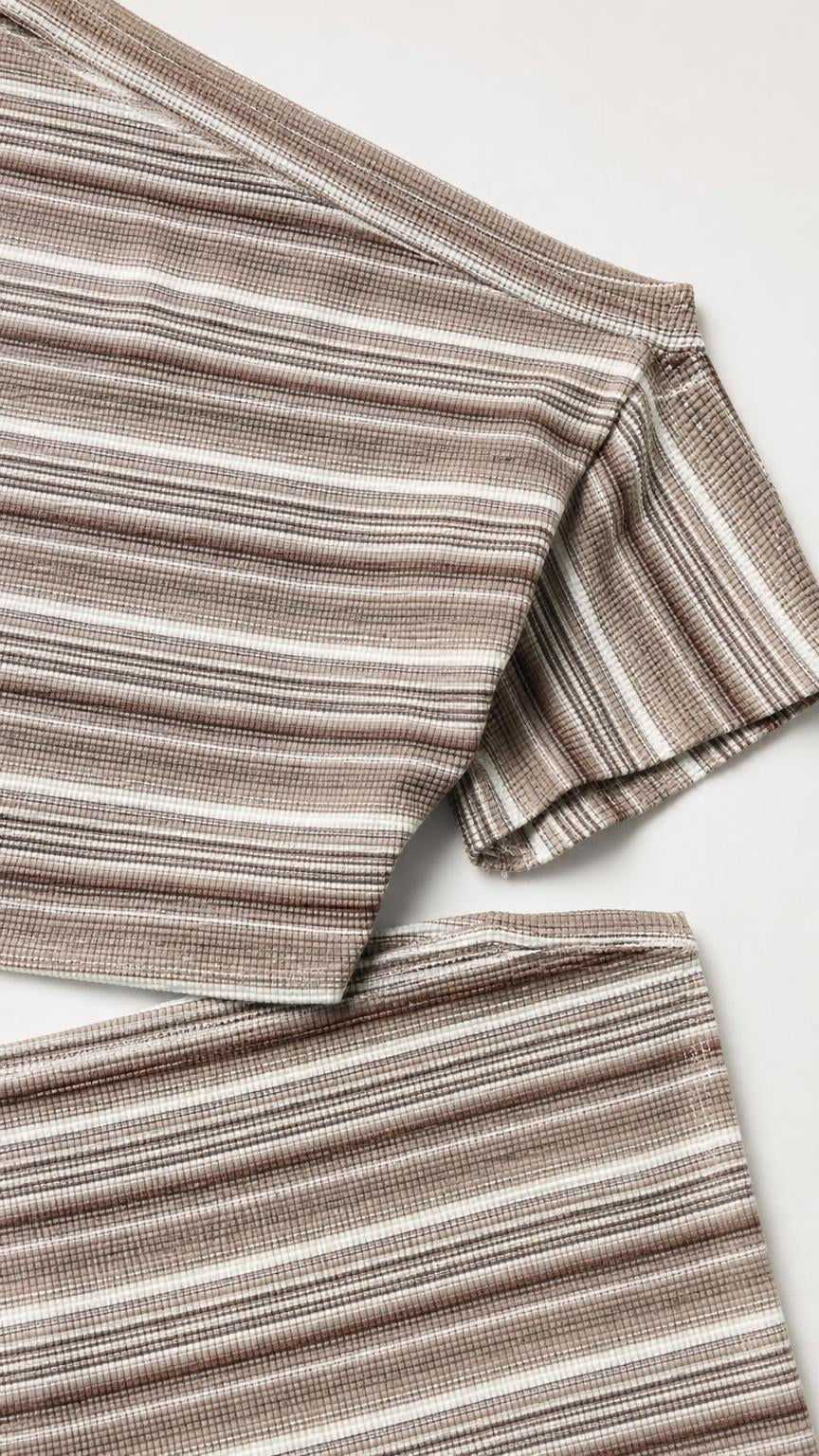 Close-up detail of fabric texture and stripe pattern of the brown set