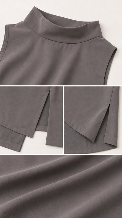 Close-up details of mock neck collar, asymmetric side split hem, and smooth fabric texture