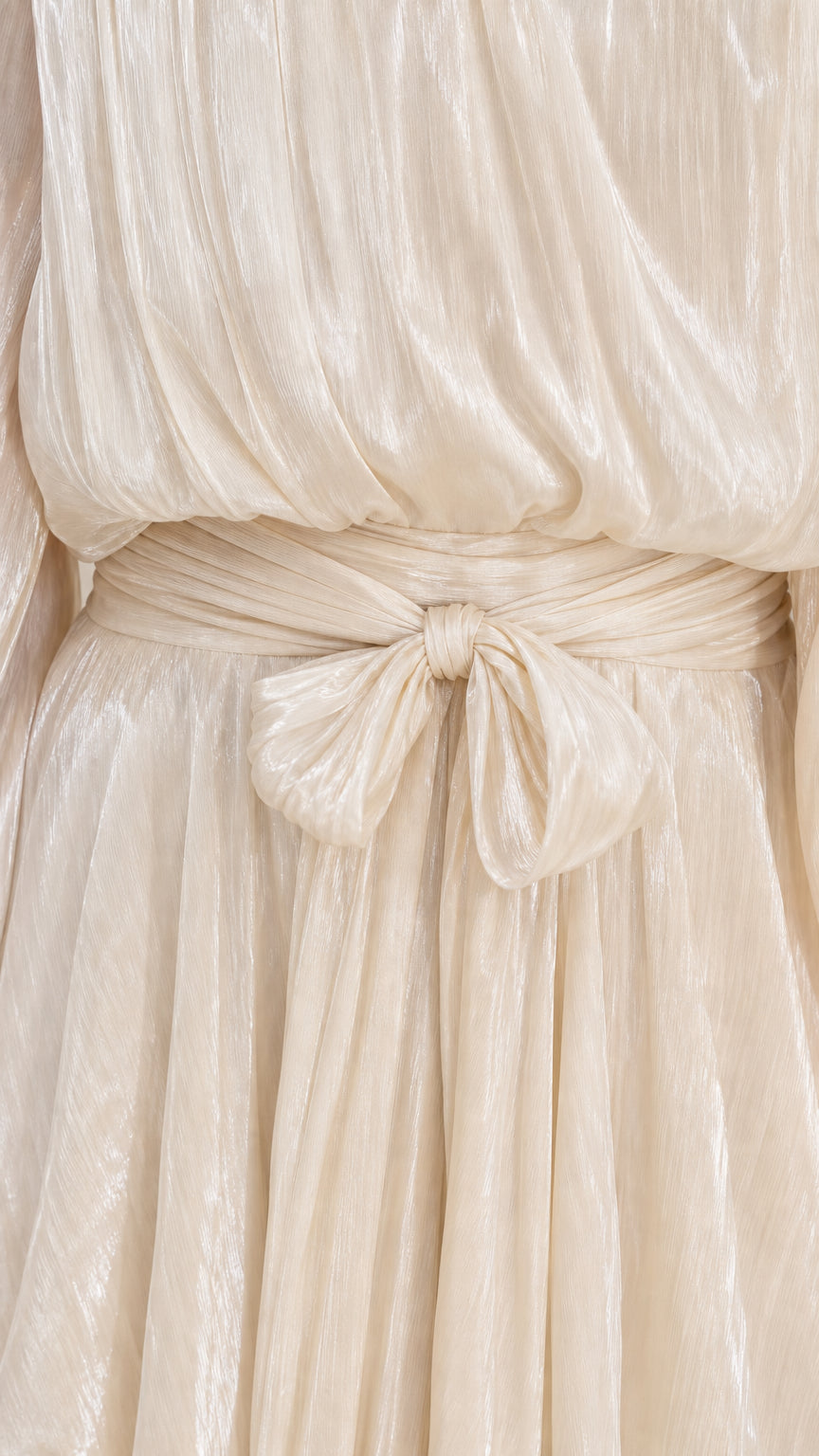 Close-up of the waist tie and fabric texture of Champagne dress