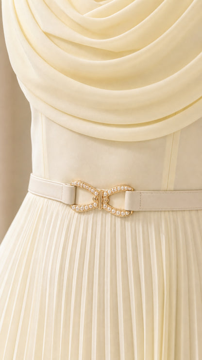 Close-up of draped cowl neckline and belted waist