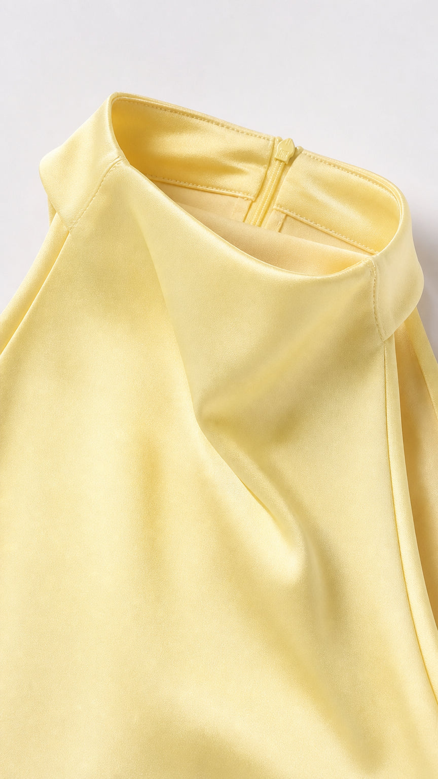 Close-up detail of high collar neckline and satin texture