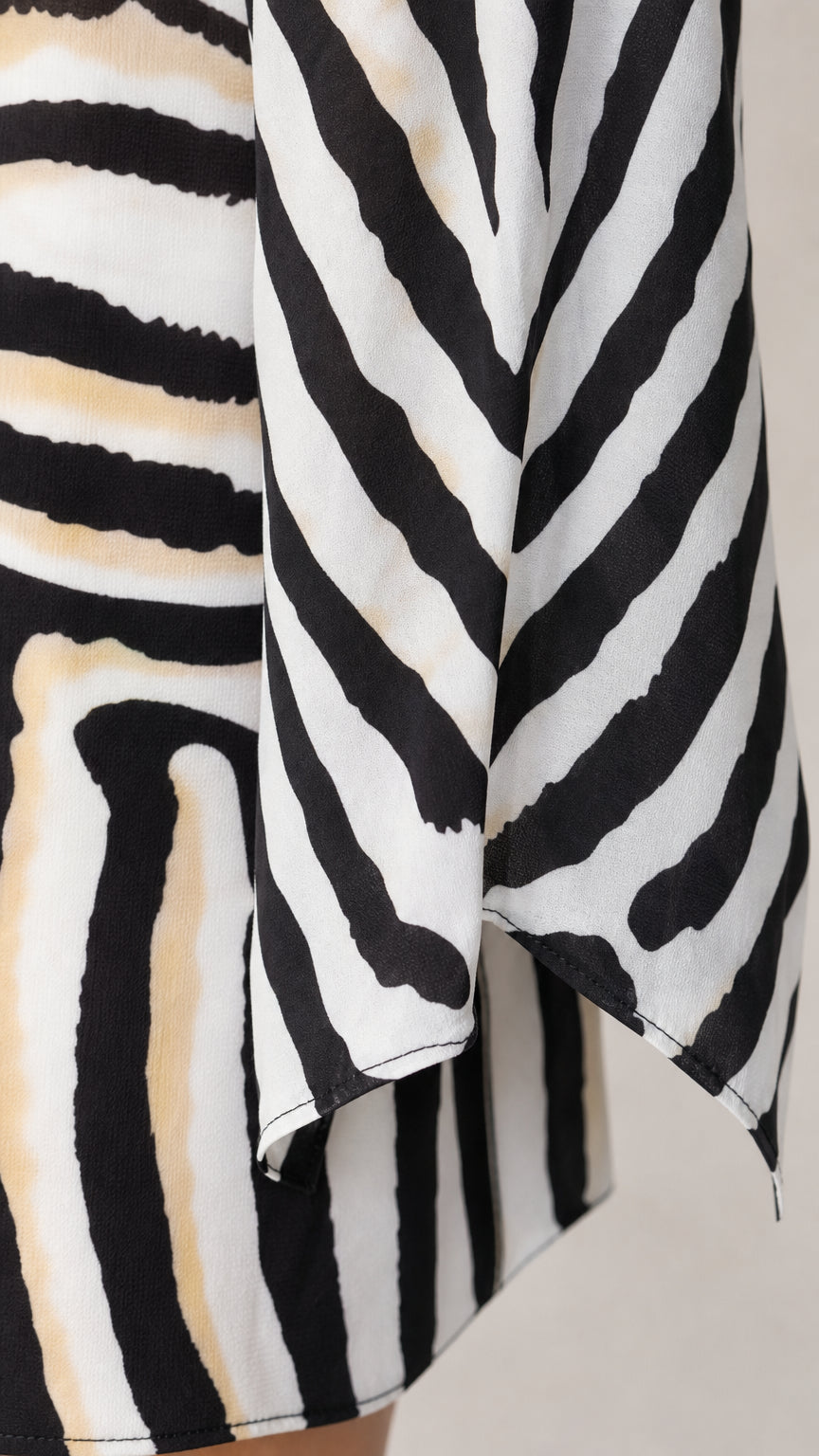 Close up of fabric texture and pattern on animal print dress