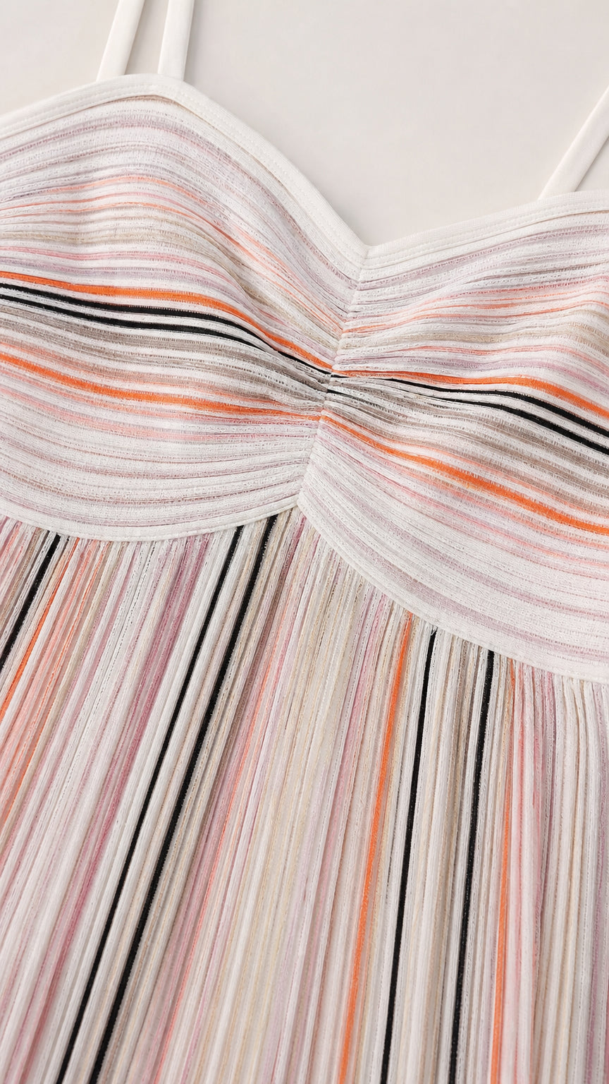 Close-up of sweetheart neckline and pleated bodice detail