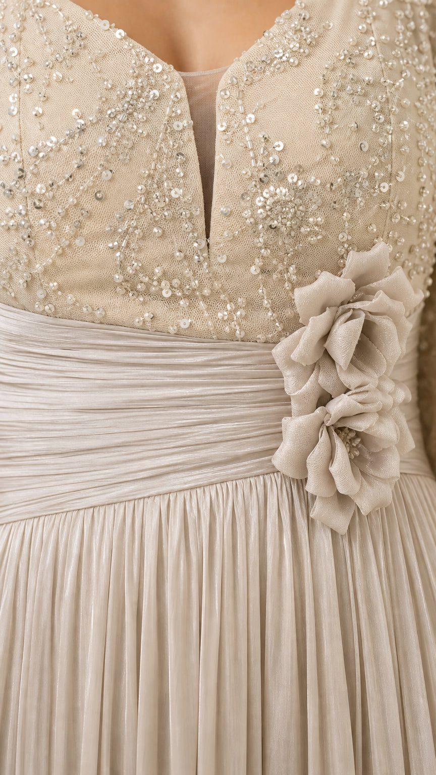Close-up detail of Champagne sequined bodice, ruched waist, and 3D floral applique