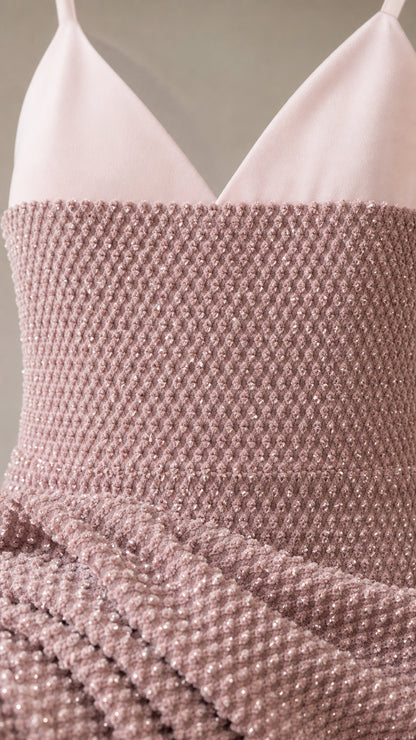 Close-up detail of bodice and textured fabric
