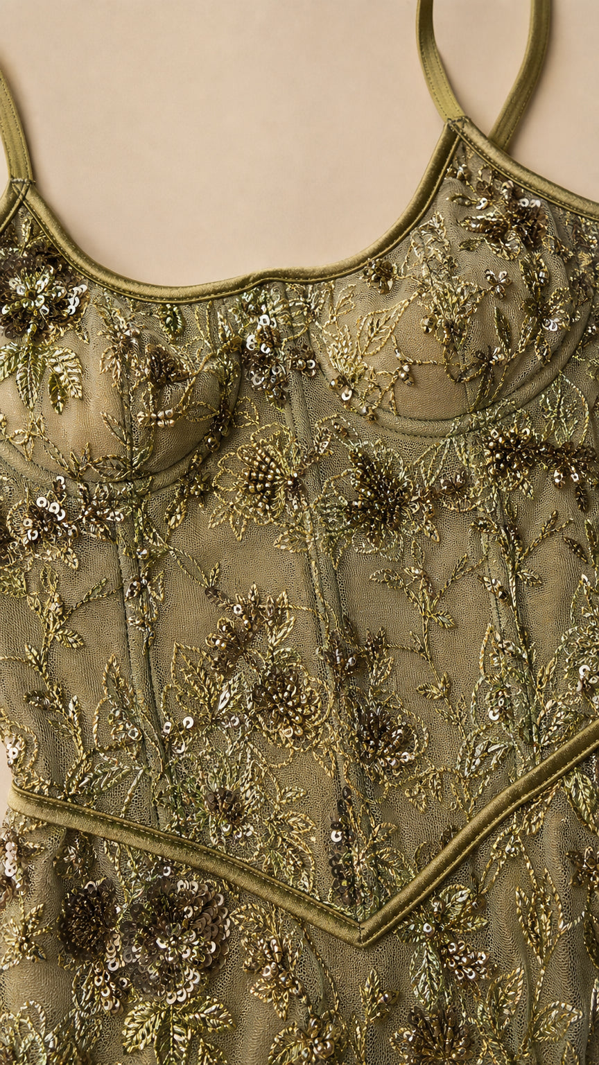 Close-up detail of bodice embroidery and sequin work