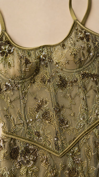 Close-up detail of bodice embroidery and sequin work