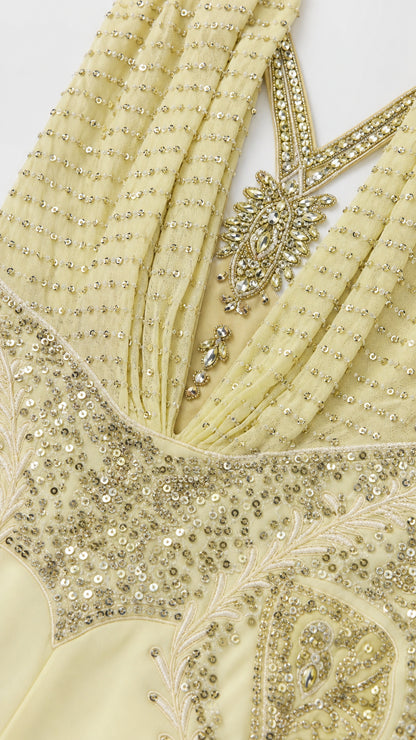 Close-up detail of sequin and bead embroidery on bodice