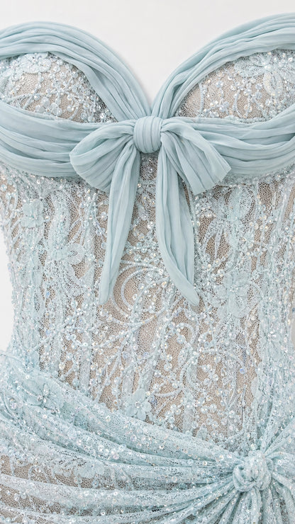 Close-up detail of sweetheart neckline and front bow