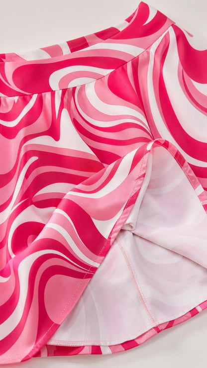 Close-up of the fabric texture and interior lining of the swirl print skirt