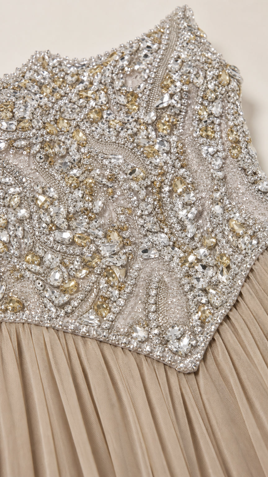Close-up detail of crystal and bead embellished bodice