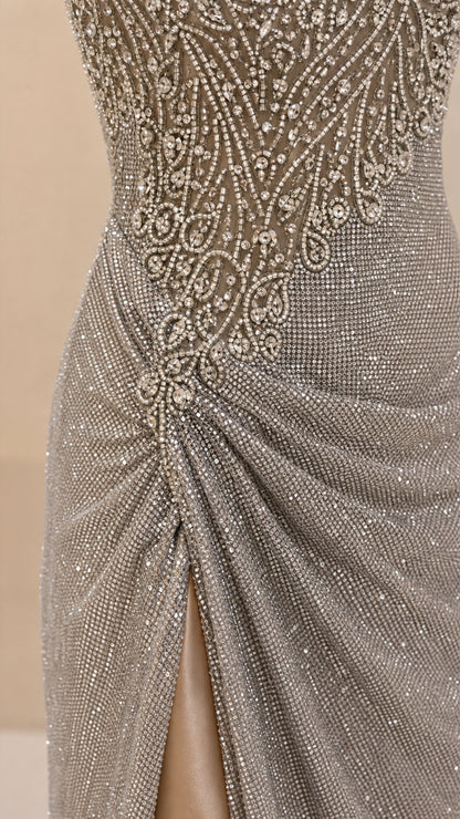 Close-up detail of beaded bodice and side ruching