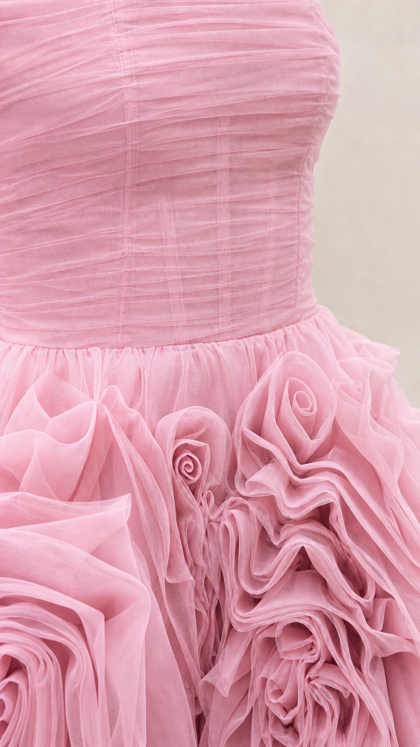 Close-up detail of bodice ruched texture and 3d rose appliques