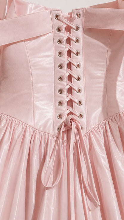 Close-up detail of lace-up corset back and eyelets on Blush Pink dress