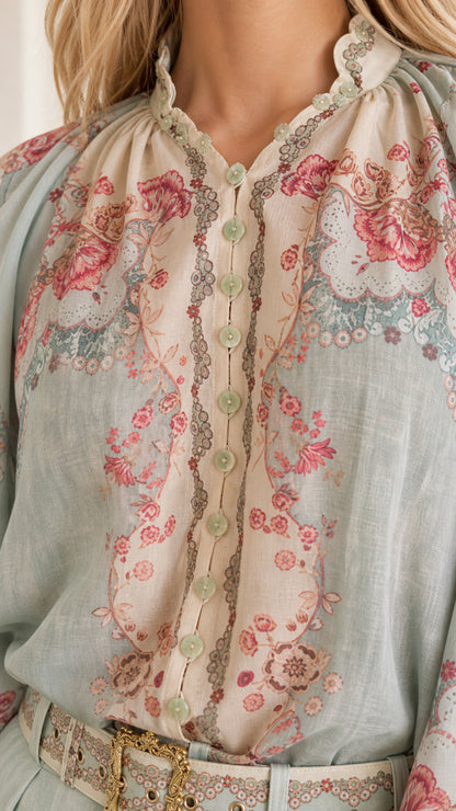 Closeup of button placket and collar detail on light blue set