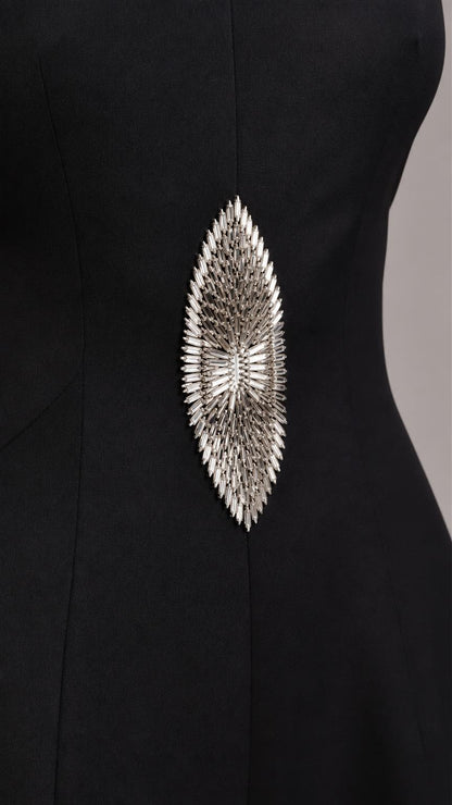 Close-up detail of the intricate silver rhinestone crystal waist applique
