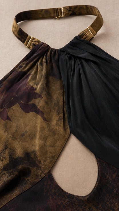 Close up of halter neckline hardware and cutout detail