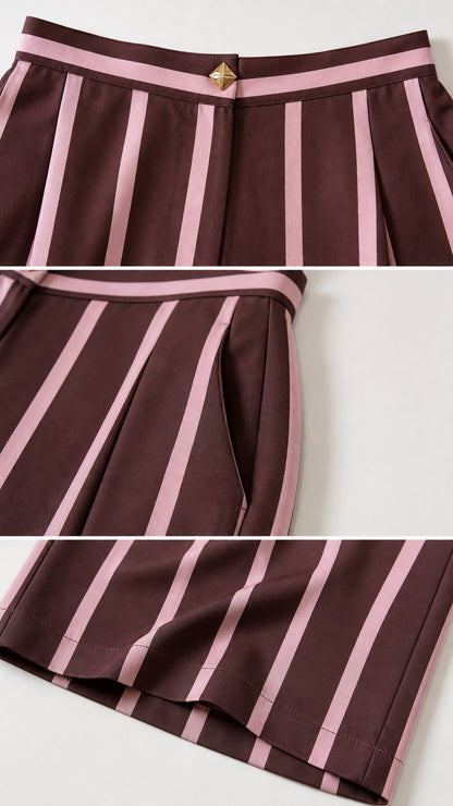Close-up details of waistband, pocket, and hem of burgundy striped pants