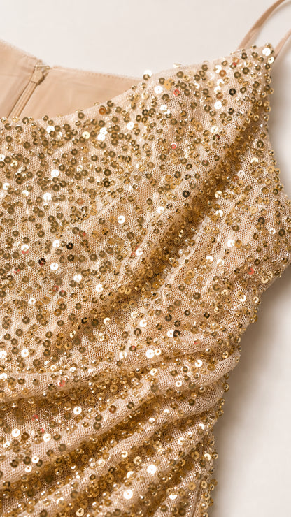 Close-up detail of Champagne Gold shimmering sequin mesh fabric and inner lining