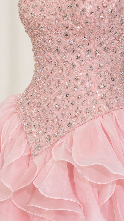 Close-up detail of the crystal and rhinestone beaded bodice on the baby pink gown
