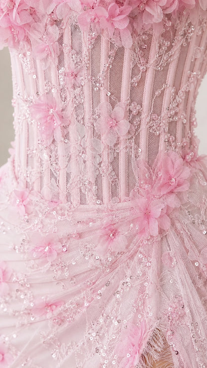 Close-up of bodice texture, sequins, and 3D floral appliques