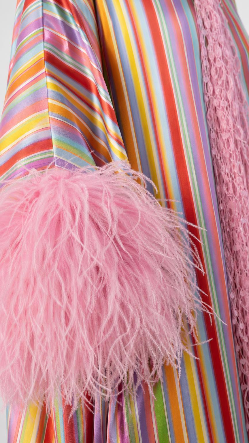 Close-up detail of multi-color fabric stripes and fluffy pink feather cuff