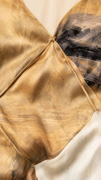 Close-up detail of the V-neckline and fabric texture