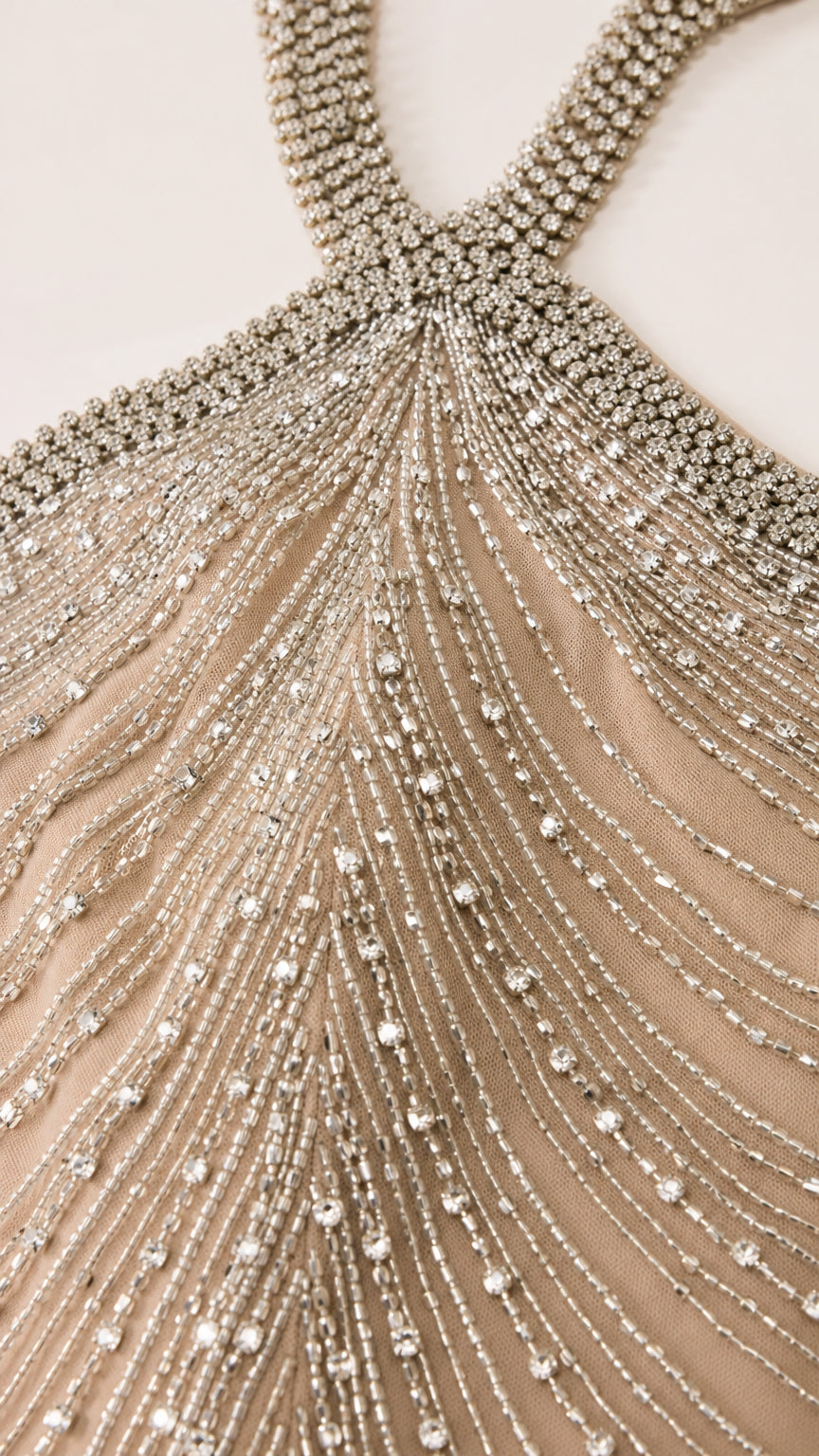 Close-up detail of crystal beadwork on halter neckline