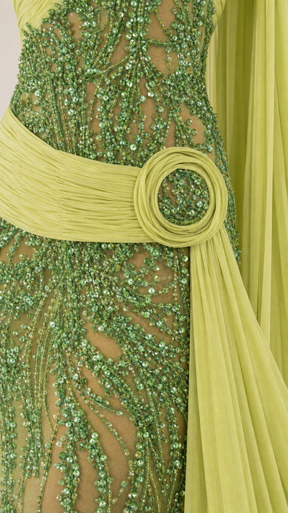 Close-up detail of beaded vine pattern and waist buckle