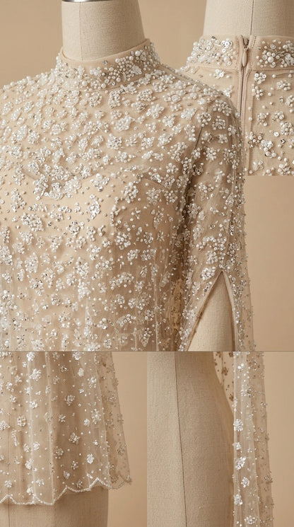 Detailed close-up of intricate sequin beading and mock neckline on cape gown