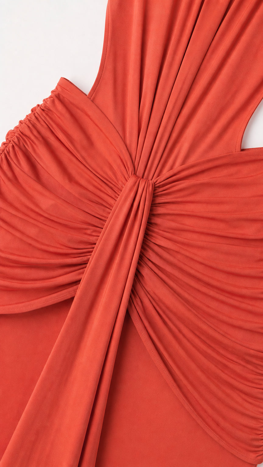 Close-up detail of gathered ruching and pleated waist drape in Rust