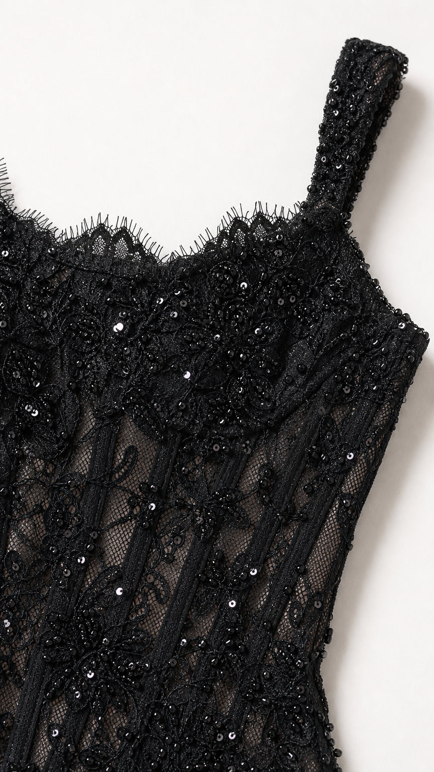 Close-up detail of sequined lace bodice and square neckline