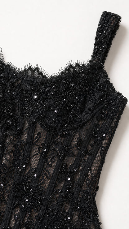 Close-up detail of sequined lace bodice and square neckline