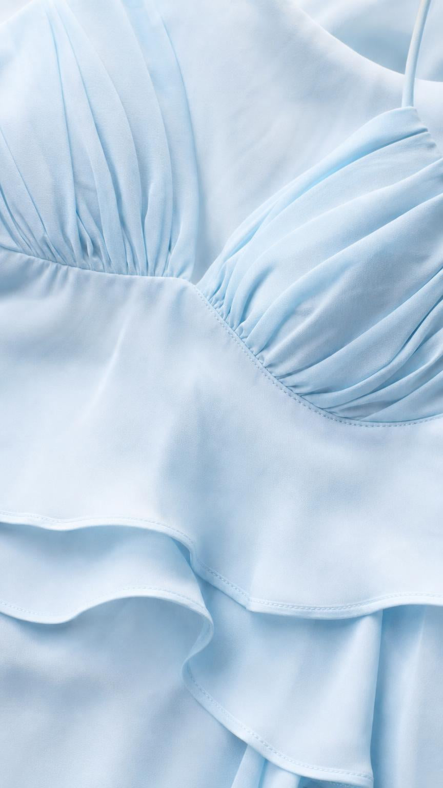 Close-up of bodice pleating and tiered fabric texture