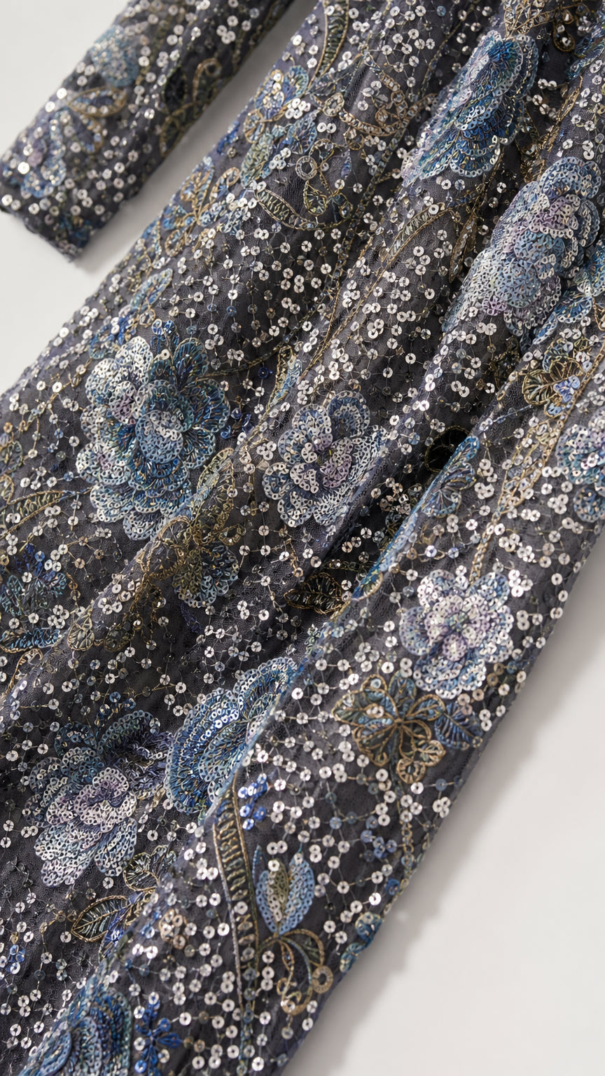 Close-up of intricate floral sequin embroidery texture
