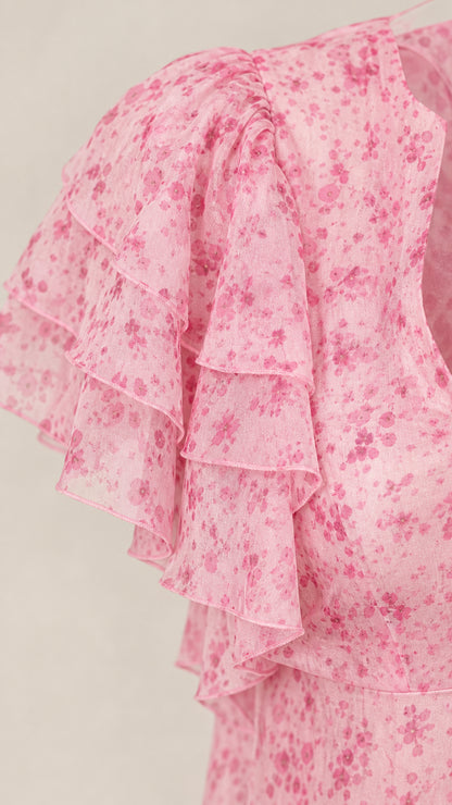 Close-up of layered ruffle sleeve on pink floral dress