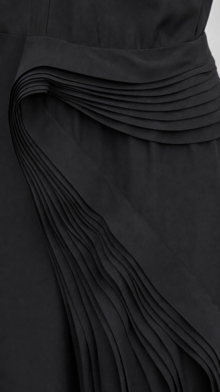 Close-up detail of accordion pleating on dress