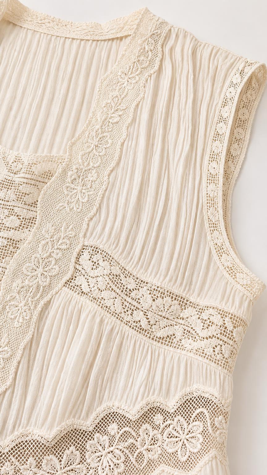 Close-up detail of lace bodice and pleated texture