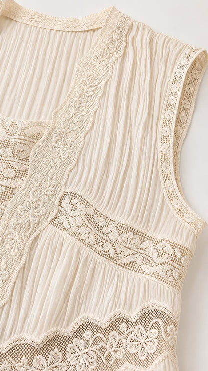 Close-up detail of lace bodice and pleated texture