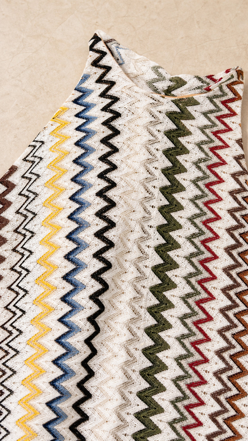Close-up flat lay of multi-color zigzag chevron knit fabric