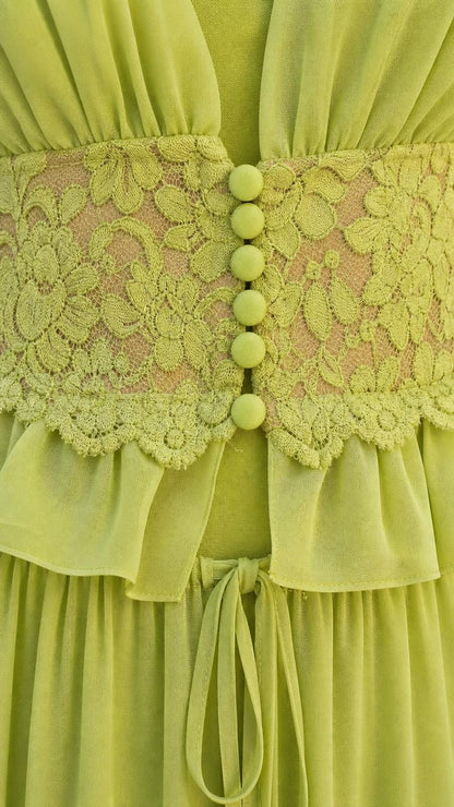 Close-up detail of bodice buttons and lace waist insert