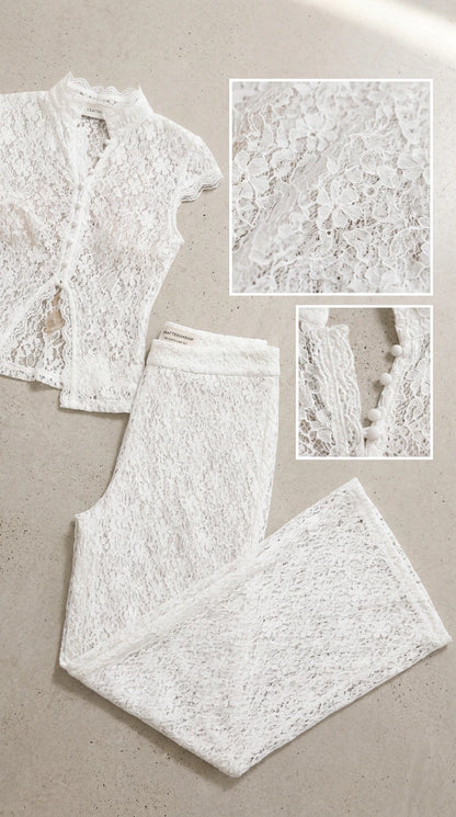 Flat lay and close-up detail of white lace fabric and buttons