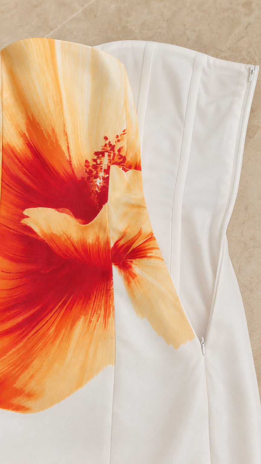 Close up detail of floral print and side zipper