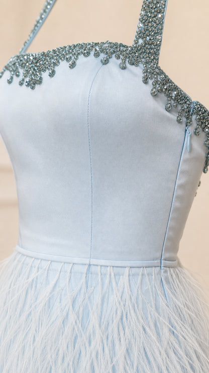 Close-up detail of beaded neckline and satin bodice on light blue dress