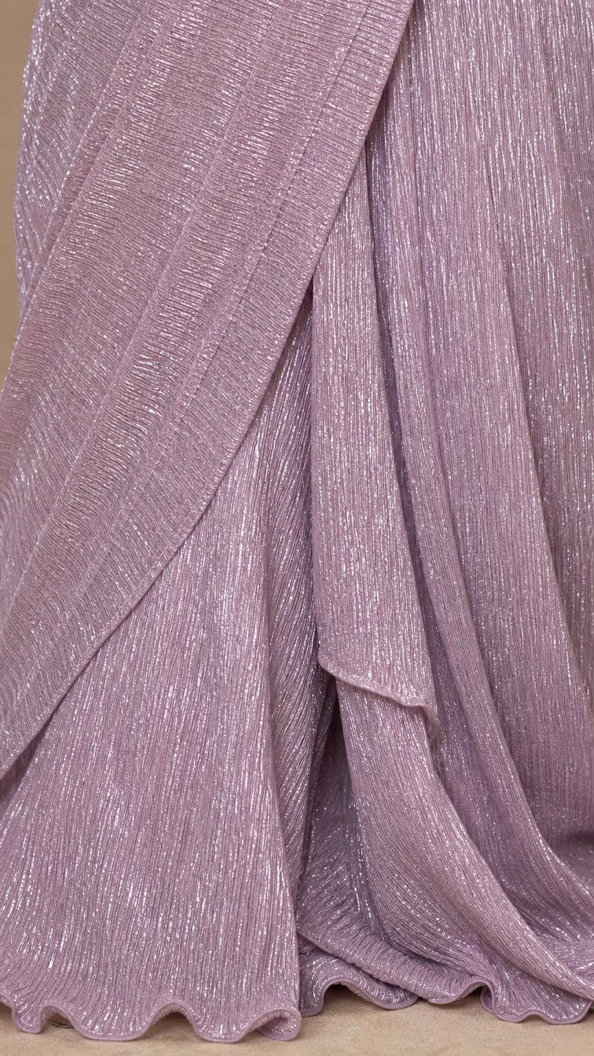 Close-up detail of shimmering texture and pleats